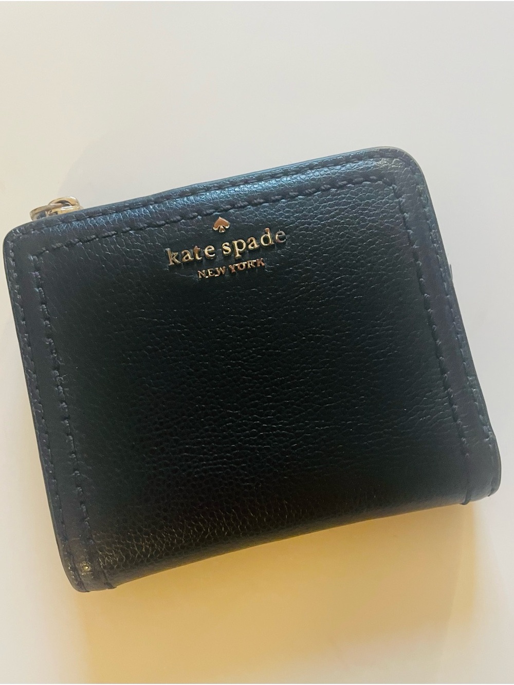 kate spade Black Leather Zip-Around Mini Wallet with Gold Logo